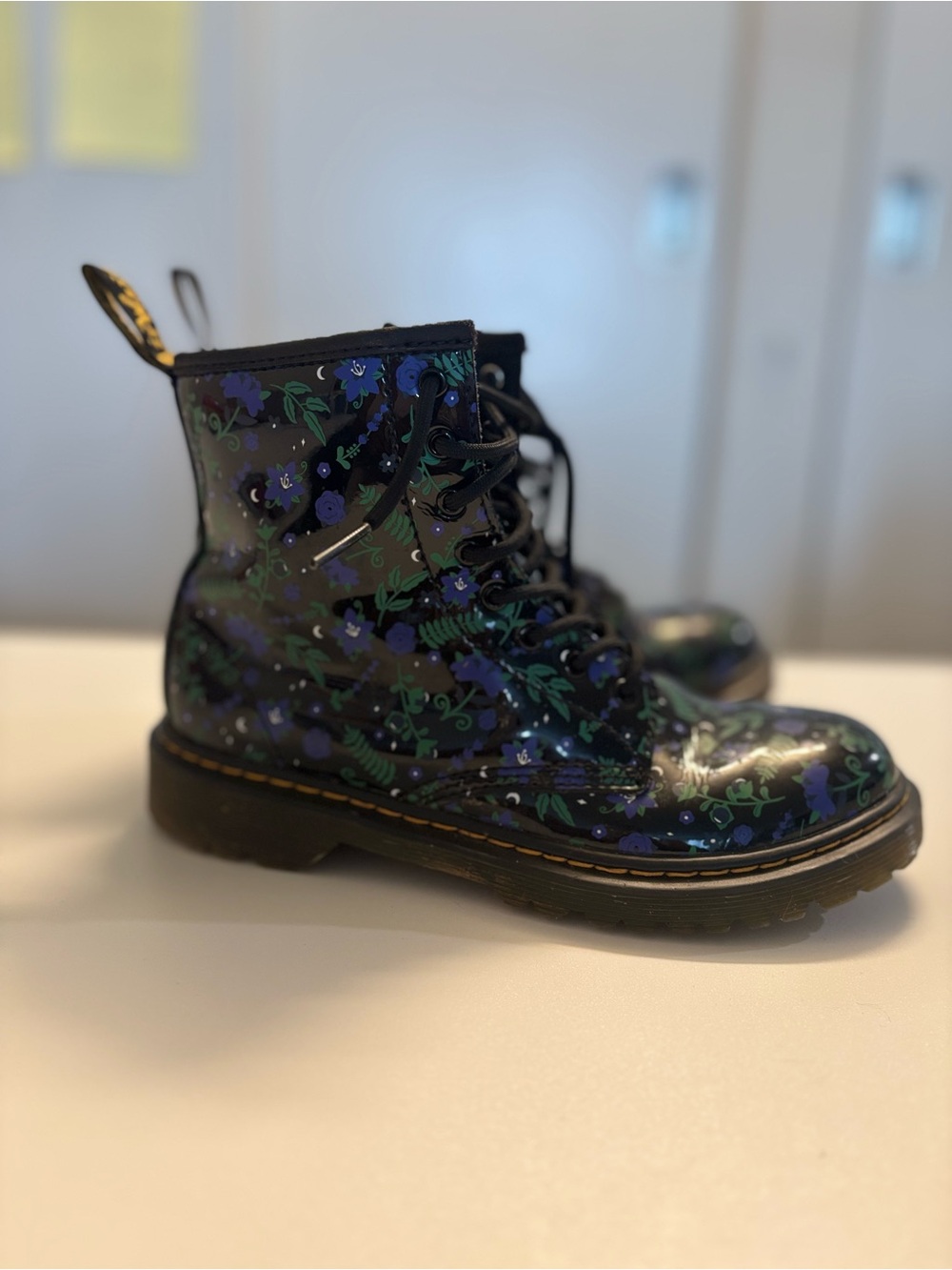 Dr. Martens Black Patent Floral Combat Boots with Blue and Green Accents